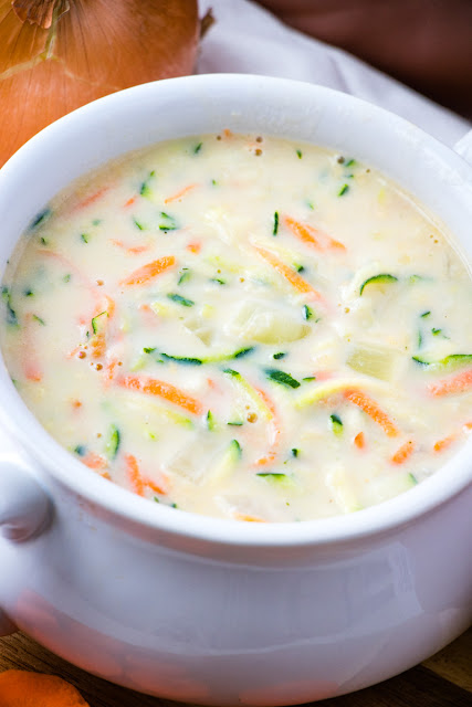 This easy and delicious soup is so perfect for lunch, dinner or freeze for later! Add leftover rotisserie chicken, bacon, cheese or herbs to make it your own! Great way to use extra zucchini or yellow summer squash from the garden!