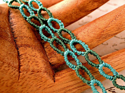 Knotted chain in micro macrame.