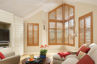 New Style Hybrid Shutters is just one Hunter Douglas option for a specialty shape window.