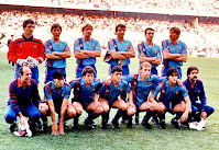 F. C. BARCELONA - Barcelona, España - Temporada 1985-86 - Urruticoechea, Gerardo, Schuster, Alexanco, Julio Alberto, Migueli; Mur (masajista), Carrasco, Víctor, Pedraza, Archibald, Marcos y Corbella (utillero) - F. C. BARCELONA 0, STEAUA DE BUCAREST 0 - En los penaltys gana el Steaua: 2 (Lacatus y Balint) a 0 (fallan Alexanco, Pedraza, Pichi Alonso y Marcos) - 07/05/1986 - Copa de Europa, final - Sevilla, estadio Ramón Sánchez Pizjuán - El Steaua gana su primer título,  mientras el Barça sigue con su maldición en la Copa de Europa
