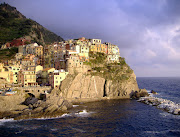 Domani partirò con un viaggio organizzato con destinazione Cinque Terre. (cinqueterre)