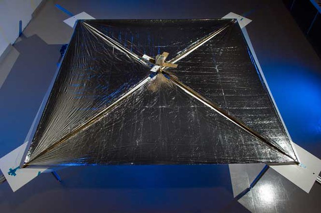 Image of a blue solar space sail representing the advancement in space exploration through solar sail technology