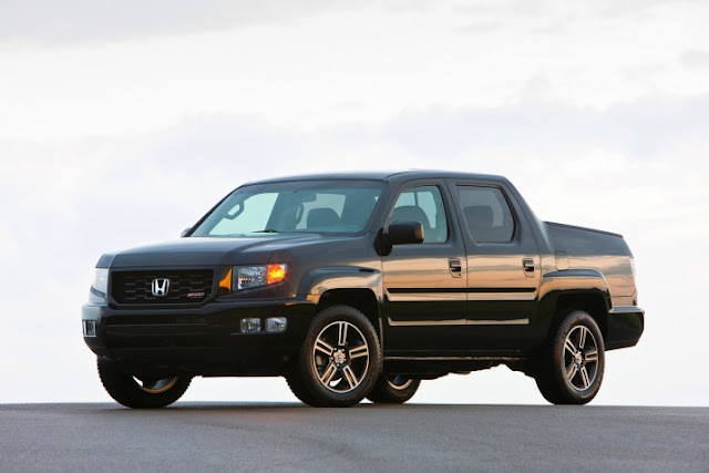 Black 2012 Honda Ridgeline Sport front 3/4 view parked