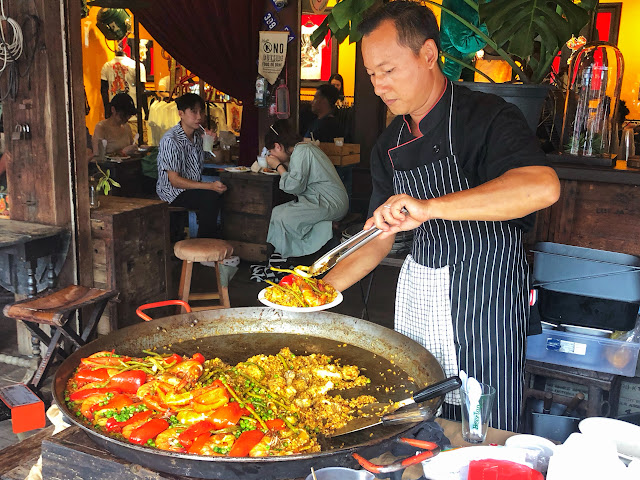 a huge pan of Paella at Chatuchak Weekend Market (JJ Market) in Bangkok, Thailand