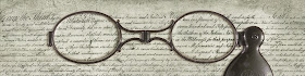 Eyeglasses over the text of the College Charter