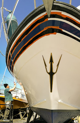 Photo of painting the black stripes around the top of the hull