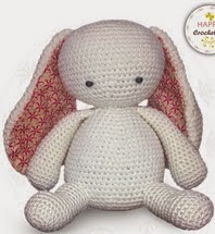 http://www.ravelry.com/patterns/library/bunny-rabbit-with-pom-pom-butt