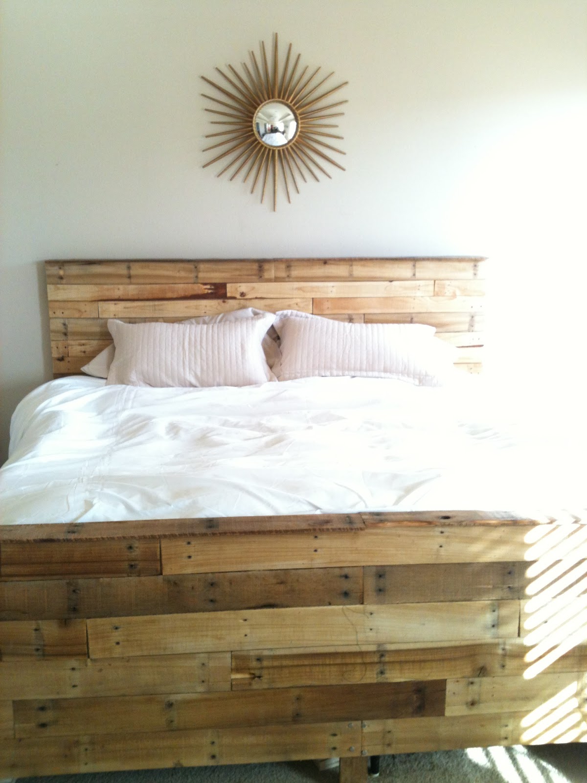 playing house: So, we made our bed out of pallets.