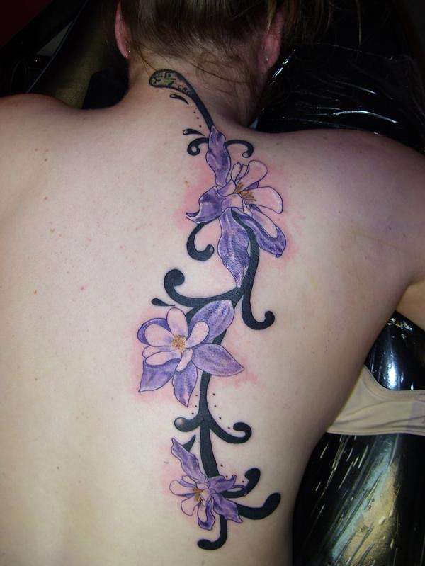 Tribal Tattoos For Upper Arm. Custom Flower on Tribal Vine