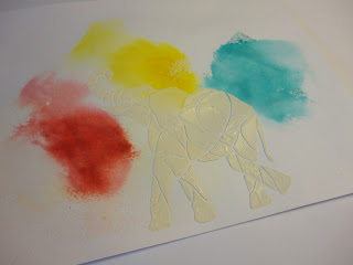 Elephant image in texture paste over red, yellow, blue bursts