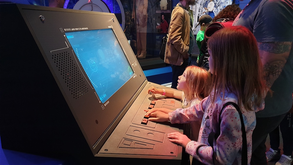 child interacting with computer screen