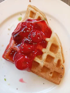 "Waffles with strawberry jelly from the breakfast Etagere at Tangelo in Paramaribo"
