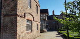 Ordsall Hall Salford Kitchen Garden area and back wall of manor house