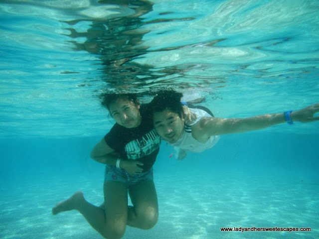 Lady and Ed at Amwaj beach in Yas Waterworld