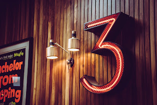 The number 3, in neon.