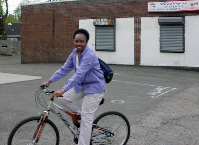 lady cyclist Dorchester white trousers