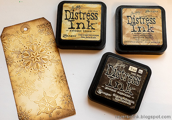 Layers of ink - Glitter and Vellum Trees Tag tutorial by Anna-Karin Evaldsson. Ink with Distress Ink.