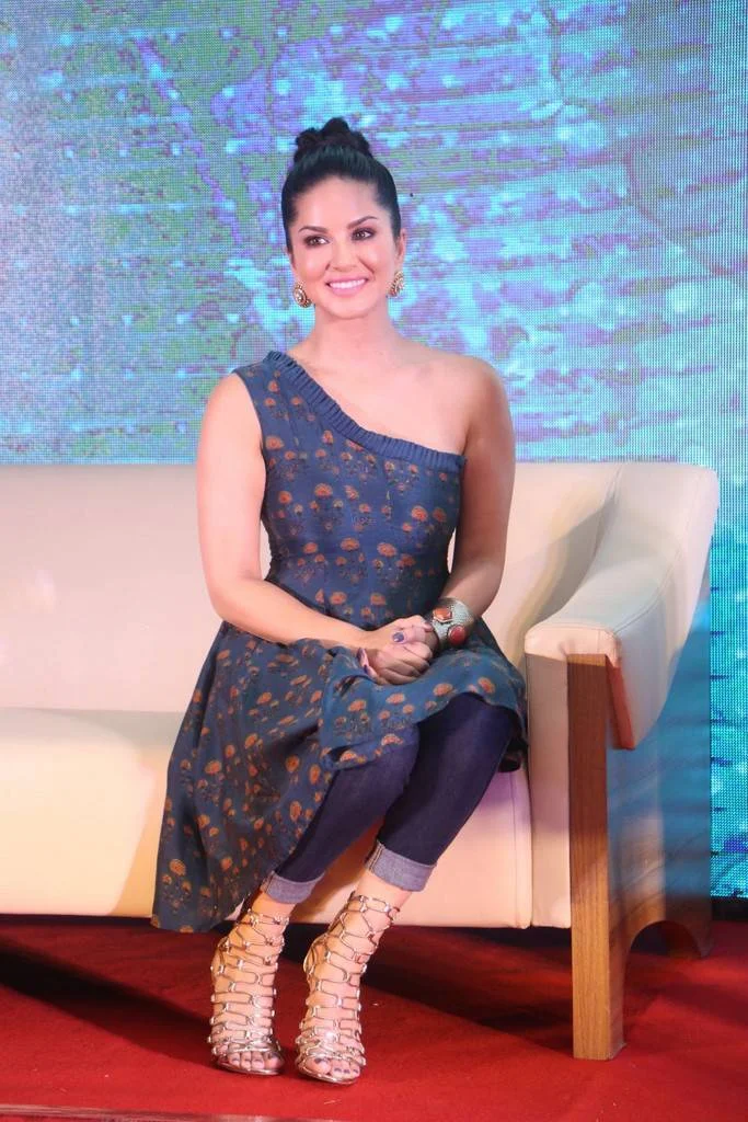 Model Sunny Leone Hot Stills In Blue Dress Tight Jeans