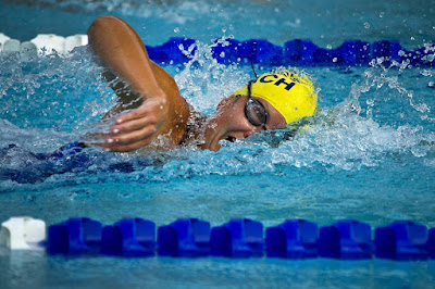 Picture of a man in his lane in the pool, swimming as alternative training for other sports