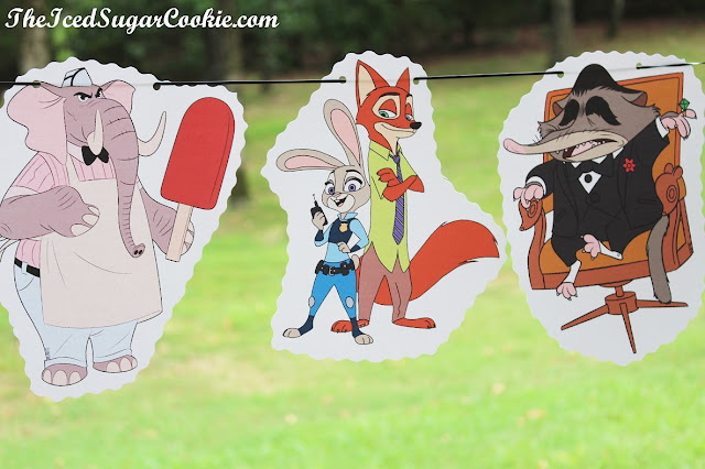 Make Your Own DIY Zootopia Food Label Cards And Hanging Flag Banner by The Iced Sugar Cookie-Mole Mr Big, Nick Fox, Judy Bunny, Flash Sloth, Elephant Jerry