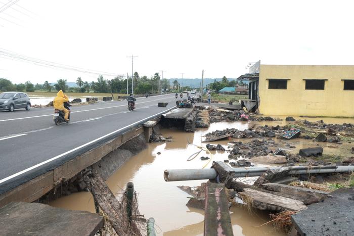 Debris from a damaged road and electric posts caused by Tropical Trami, locally named Kristine, in Polangui, Albay province, Philippines on October 23, 2024