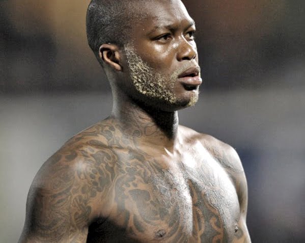 djibril cisse tattoos. Djibril Cissé: France