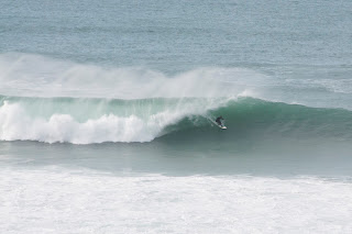 Surfing giant waves off newquay headland