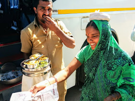 Local woman selling traditional lunch in front of Pattadakkal temple, Karnataka