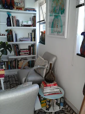 BLENDING BOOKS AND ART  IN A SPACE   BY MIABO ENYADIKE