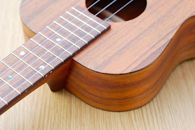 Kanile'a K1 Tenor ukulele wear on top
