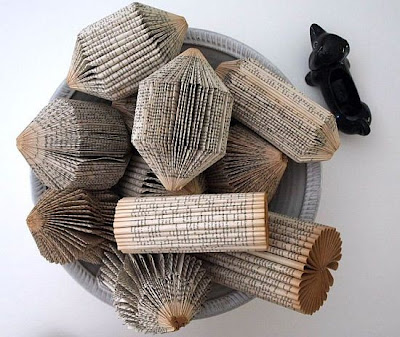 Beautiful things can be made from books with a knife www.coolpicturegallery.net