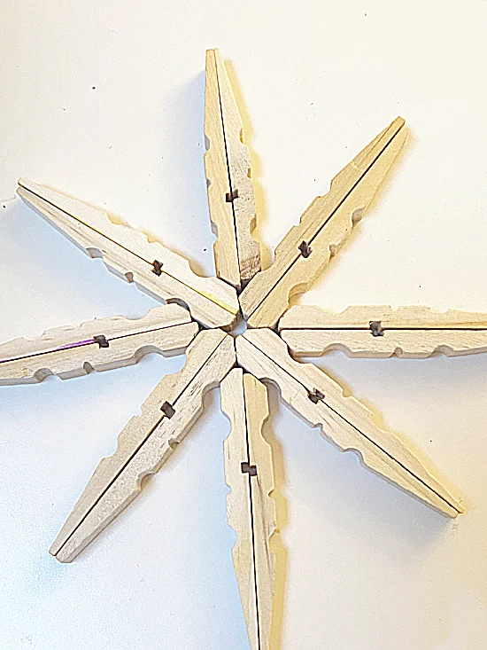 snowflake made with clothespins