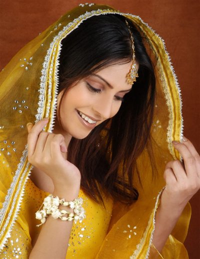 Traditionally Pakistani brides wear shades of yellow for their mayoon dress