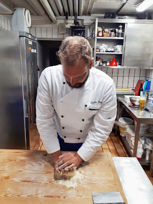 Kneading pasta dough in Trentino