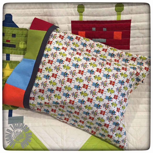 Robots All In A Row Coordinating Pillow by Thistle Thicket Studio. www.thistlethicketstudio.com