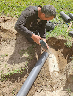 Chiseling into the cement pipe