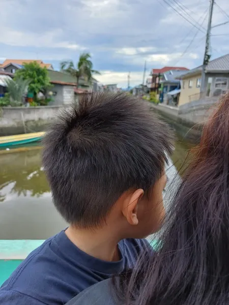 Mommy and Rafa looking at the river in San Jose Gumi, Pampanga