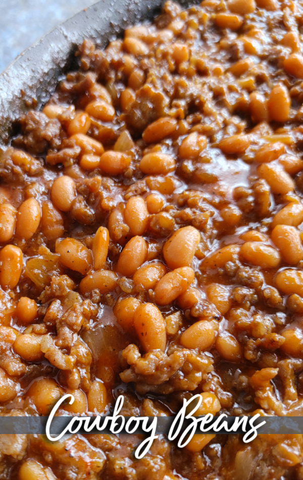 Cowboy Beans! A hearty recipe made with pork n' beans, ground beef, sausage, brown sugar and a simple sauce that's perfect for cookouts, barbeques and covered-dish affairs (finish in crock pot or on the stove).