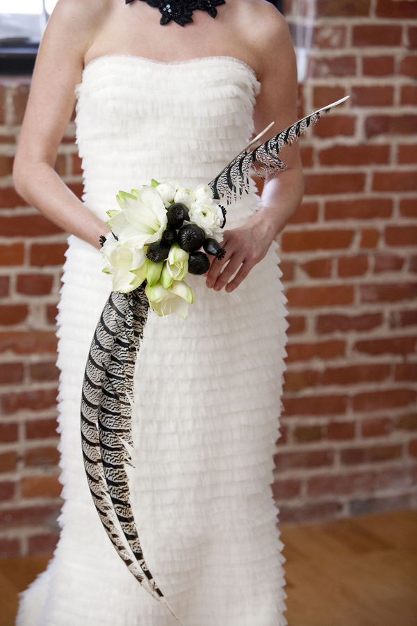 A very modern black and white wedding theme The table centerpiece is 