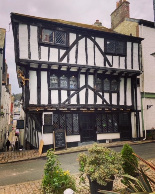 The Angel pub, a half-timbered building.