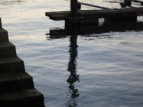 Stone steps leading down to water in Weymouth Harbour.