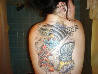 Big Koi Fish On Back Body
