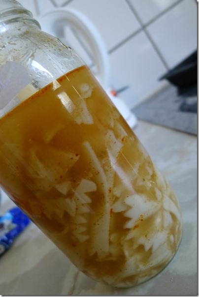 cooking pasta with a glass bottle