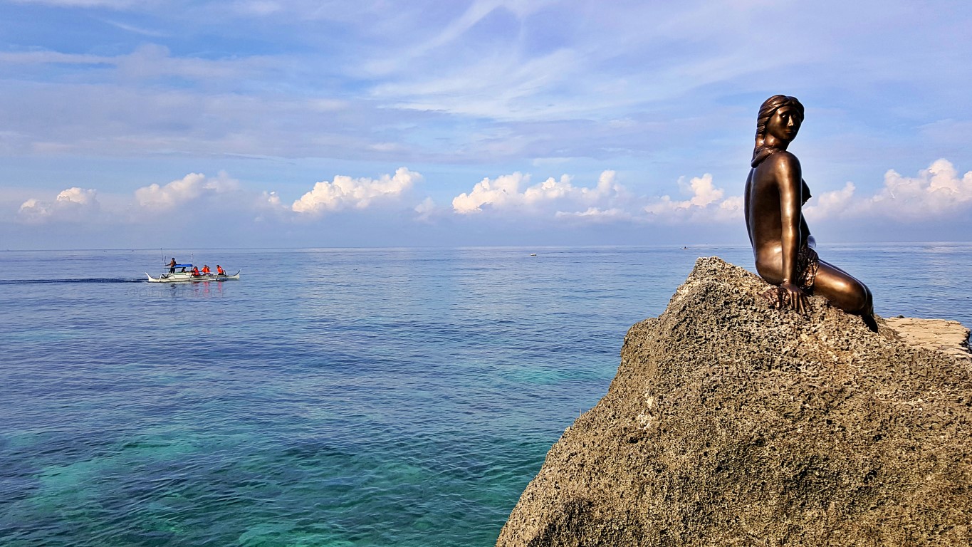 the little mermaid statue at the sunrise boulevard at Isla Jardin Del Mar Resort in Glan, Sarangani