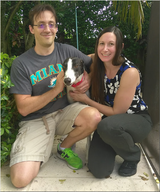 Hawk with new adoptive parents Mark and Amy