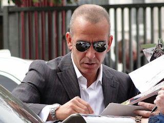 Di Canio signing autographs on a return visit to Upton Park in 2010. He had been hugely popular there