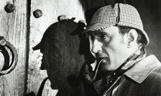 Bolac and white photo of Sherlock Holmes