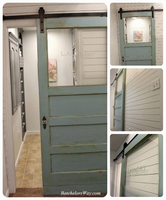 blue old vintage door with window is transformed into sliding door