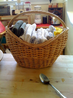 Reusable cloths in basket