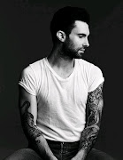 Adam Levine when appearing and showed cool tattoos on his hand (tumblr ll pujag qd hbo )